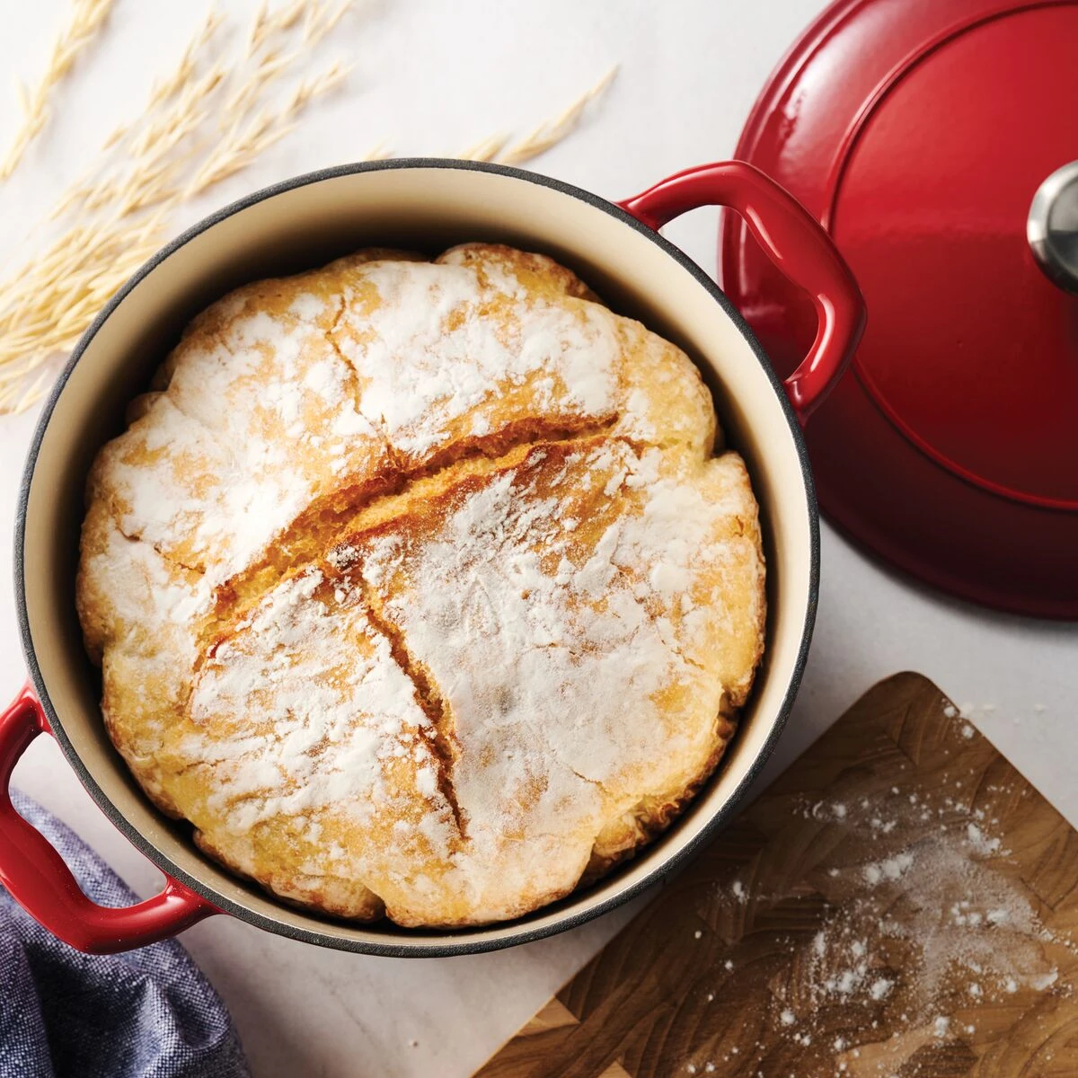 Tramontina 6.5 Qt Enameled Cast-Iron Series 1000 Covered Round Dutch Oven - Gradated Red 3 Tramontina 6.5 Qt Enameled Cast-Iron Series 1000 Covered Round Dutch Oven - Gradated Red - Image 3